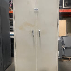 Tan used two door storage cabinet with two handles