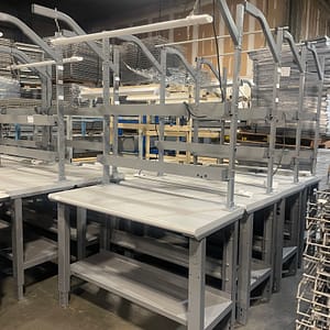 Multiple used 24x48 workbenches with back risers and light bars