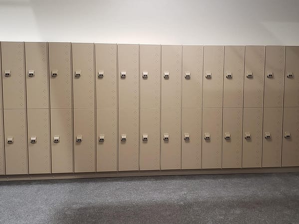 Two-tier HDPE lockers, with a tan finish.