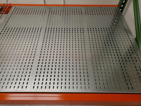 Perforated decking for pallet rack.