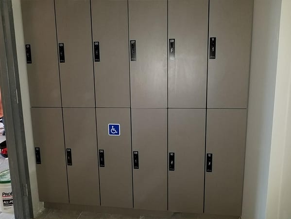 Two-tier phenolic lockers, with a gray finish.