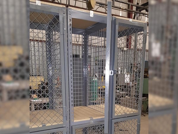 Lockers made from rivet shelving and wire partitions.