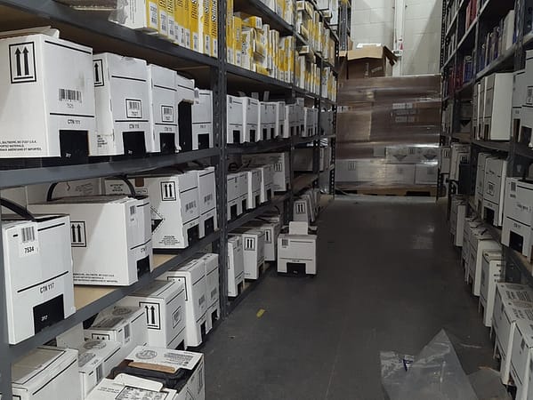 Rivet shelving filled boxes and other products.