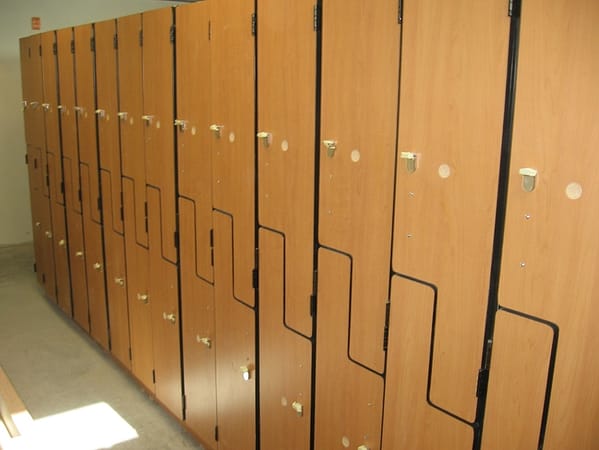Wood z-lockers in a lock room.