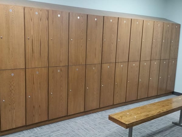 Wood lockers in a locker room.