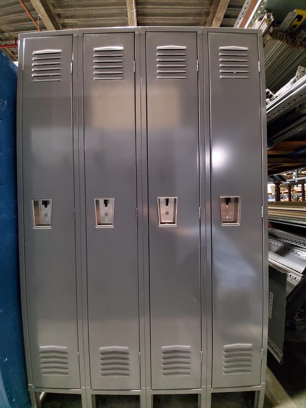 Used single-tier metal lockers with a gray finish.