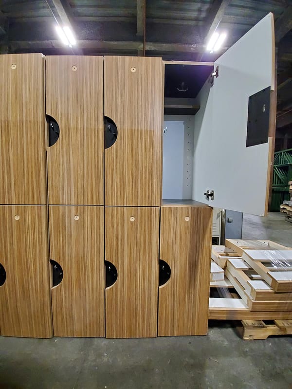 Used two-tier plastic laminate lockers with a wood style finish.
