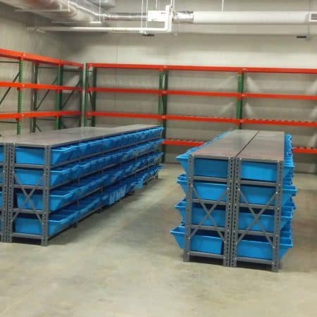 Cover image with pallet rack and shelving with bins.